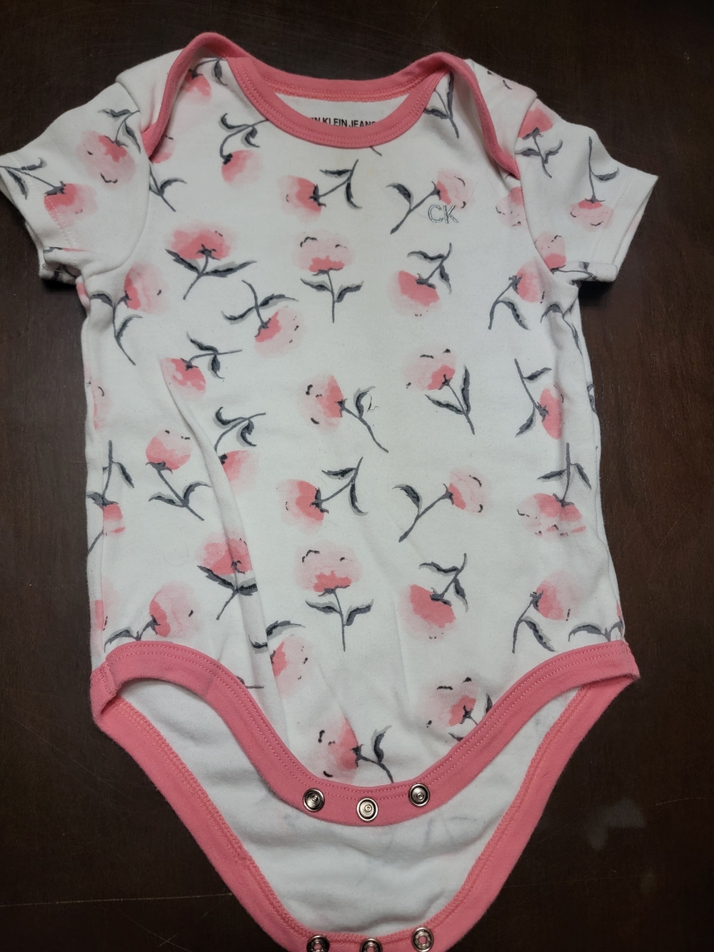 Calvin Klein Jeans White Baby One-Piece with Pink Floral Trim